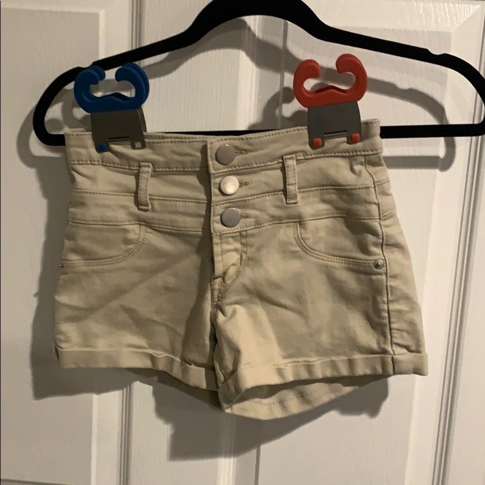 Tan colored shorts